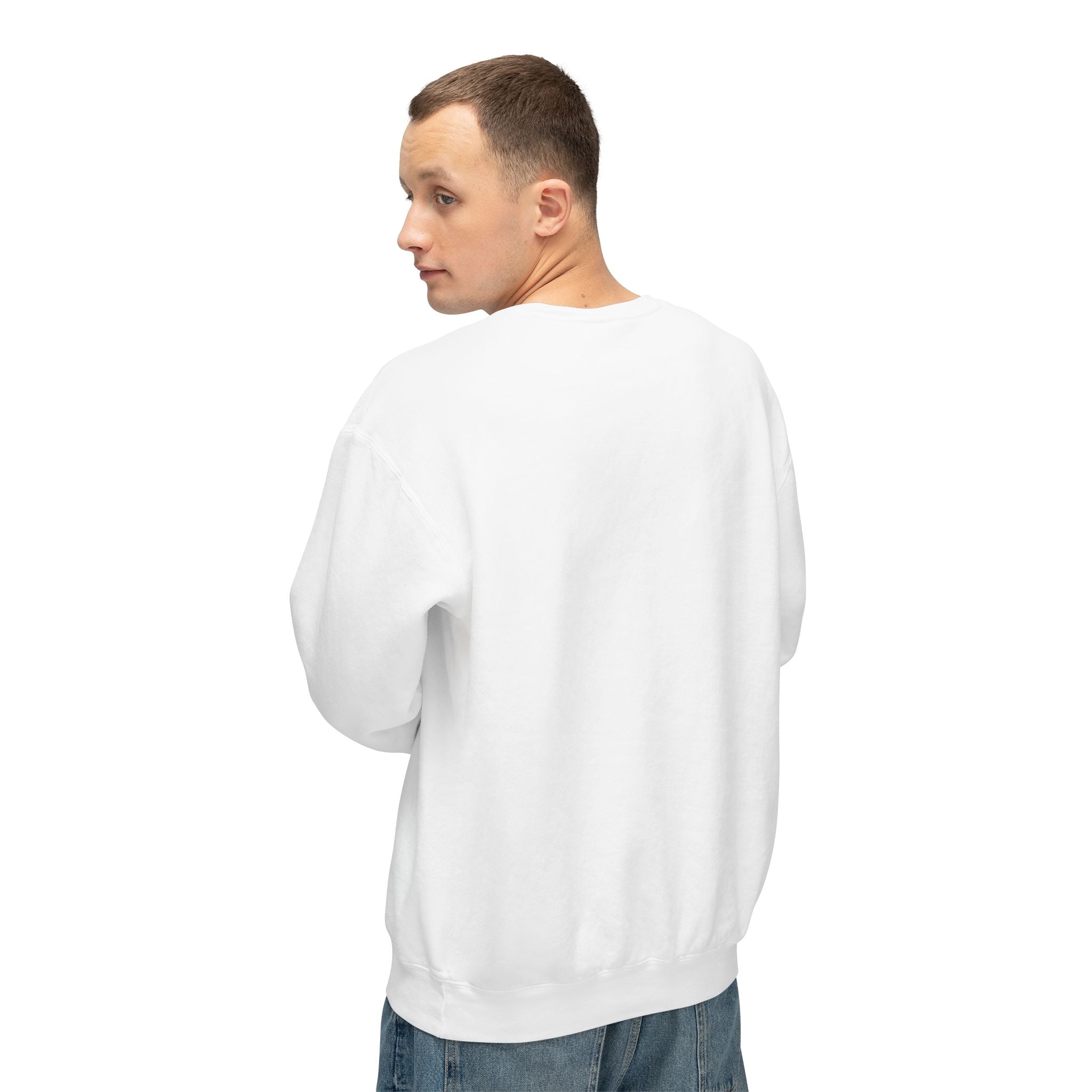 Man wearing a white sweater and blue jeans on a white background
